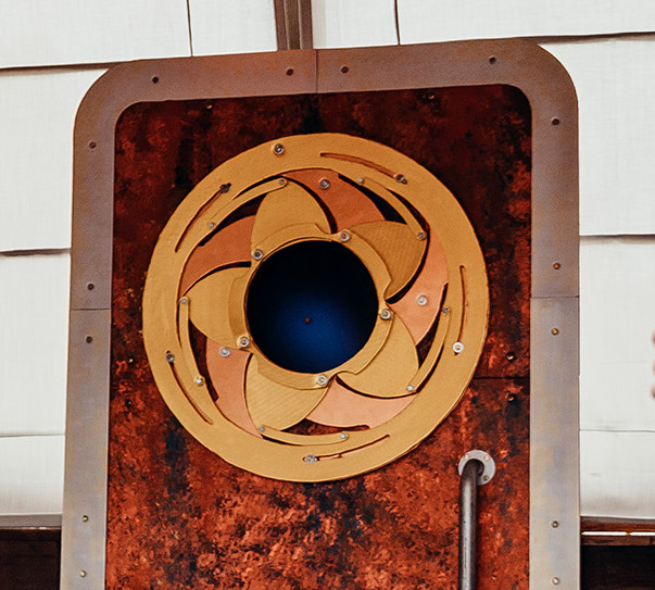 Art piece in shape of steam-punk spaceship door