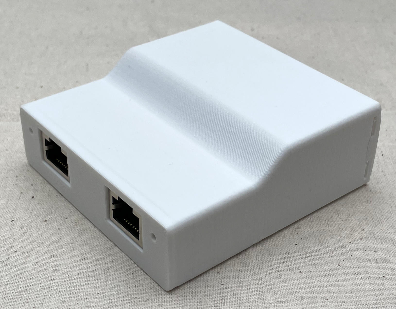 White 3D printed case for the Starlink PSU low voltage board