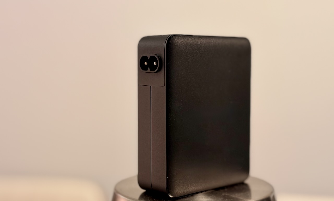 White-label USB-C travel charger fitted with its swappable IEC C8 inlet head